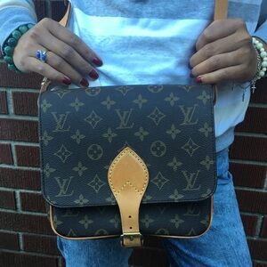 Authentic Louis Vuitton Cartoucheirre Pm